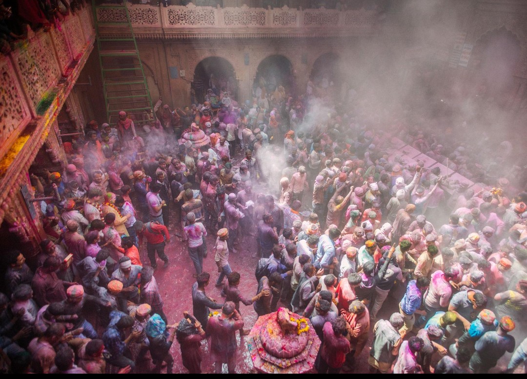 Massive Crowds Gather for Holi Celebrations in Mathura