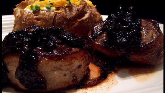 Bacon Wrapped Steak With Balsamic Onion Sauce recipe