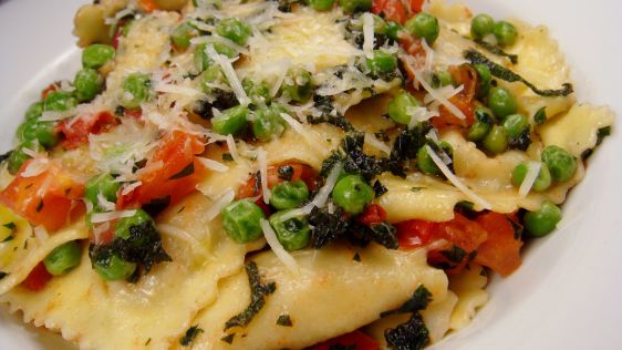 Ravioli With Peas Tomatoes And Sage Butter Sauce recipe